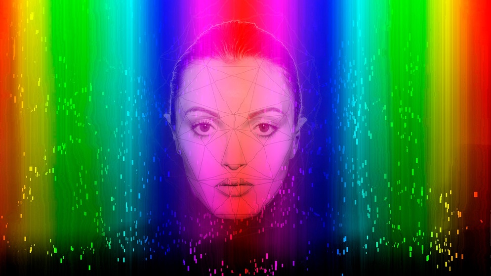 Young woman with face recognition artificial intelligence technology on multi-colored background | Bildquelle: picture alliance / Westend61 | Emma Innocenti