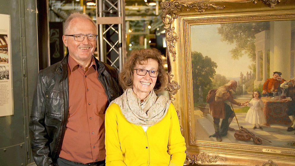 Das Gemälde eines Bettelmusikanten stammt aus Düsseldorf, der Maler aus Amerika. Für die Experten im Nürnberger Museum Industriekultur passt das gut zusammen ...  | Bildquelle: BR