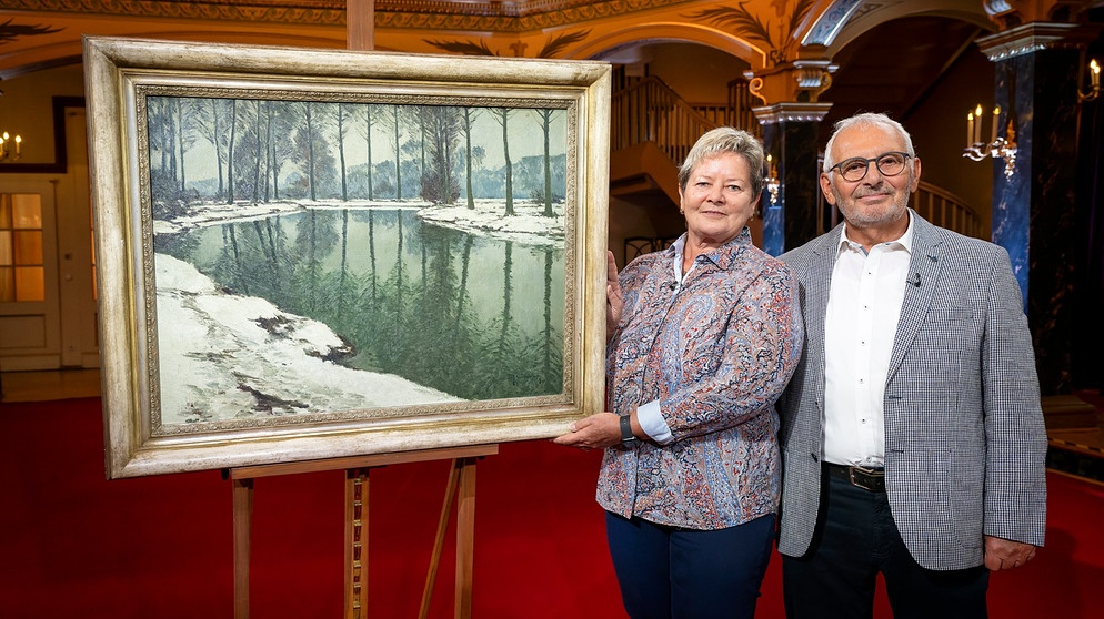 Klirrend kalt wirkt diese Winterlandschaft am Fluss. Können die Experten von "Kunst + Krempel" bestimmen, welcher Fluss hier dargestellt wurde? Die geometrische Anordnung der Bäume ähnelt einem Gitter - ein Hinweis auf die Entstehungszeit ... | Bildquelle: BR/Ralf Wilschewski